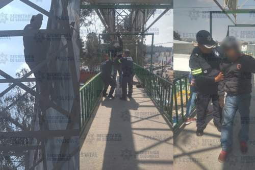 Policías logran salvar a hombre que pretendía lanzarse de espectacular en Zinacantepec